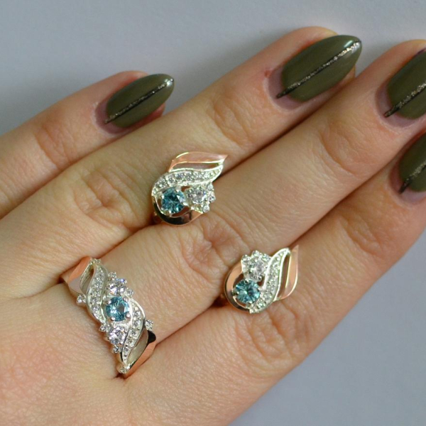 Срібний набір з золотими пластинами