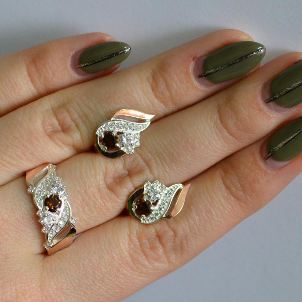 Срібний набір з золотими пластинами