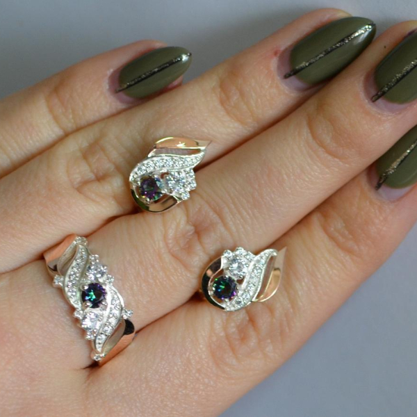 Срібний набір з золотими пластинами