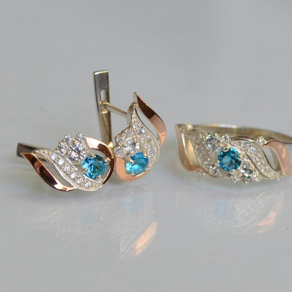 Срібний набір з золотими пластинами