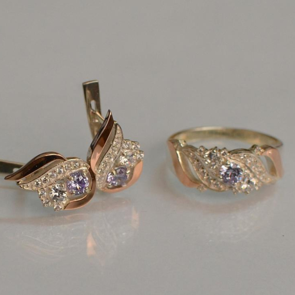 Срібний набір з золотими пластинами