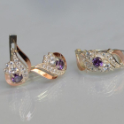 Срібний набір з золотими пластинами