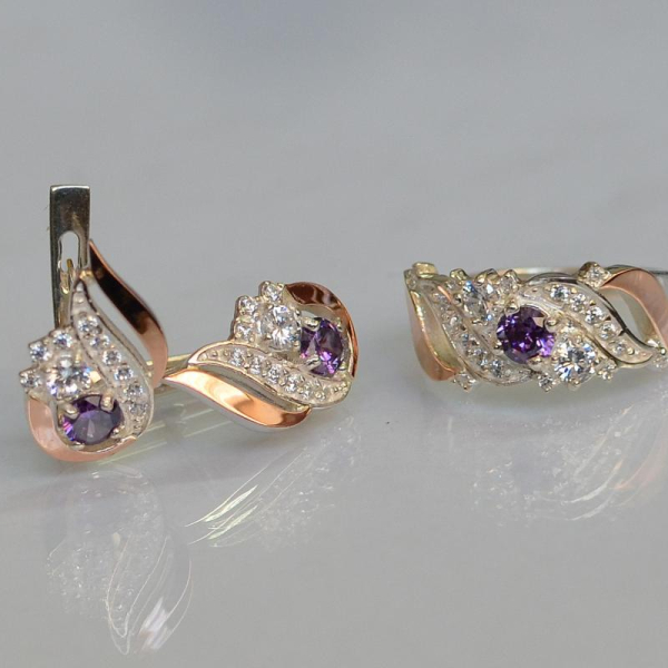 Срібний набір з золотими пластинами