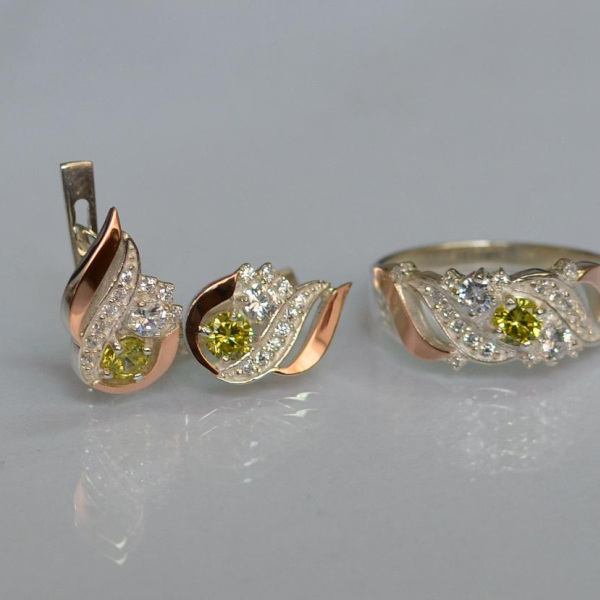 Срібний набір з золотими пластинами