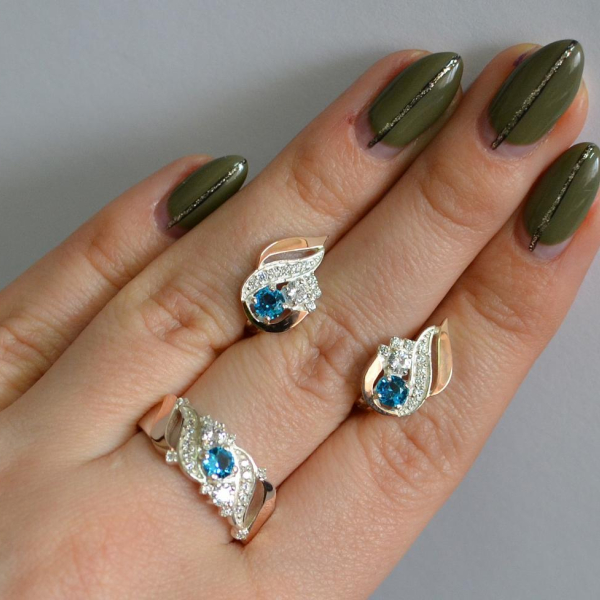 Срібний набір з золотими пластинами