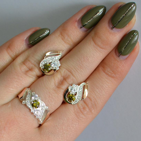 Срібний набір з золотими пластинами