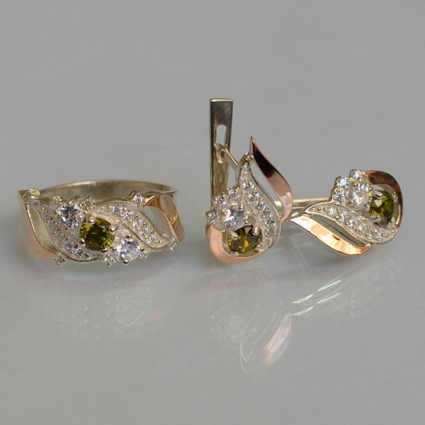 Срібний набір з золотими пластинами