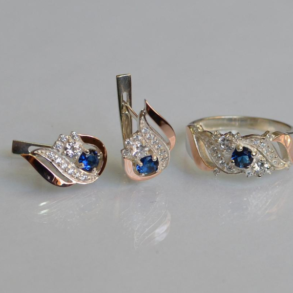 Срібний набір з золотими пластинами