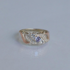 Срібна каблучка з золотими вставками