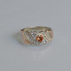 Срібна каблучка з золотими вставками