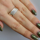 Срібна каблучка з золотими вставками