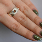 Срібна каблучка з золотими вставками