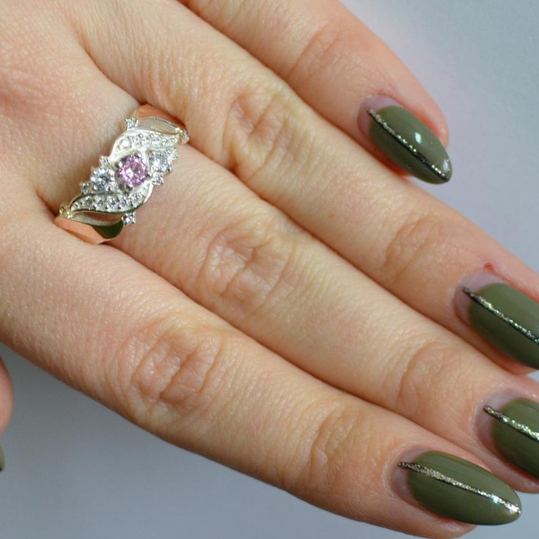 Срібна каблучка з золотими вставками