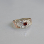 Срібна каблучка з золотими вставками