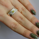 Срібна каблучка з золотими вставками