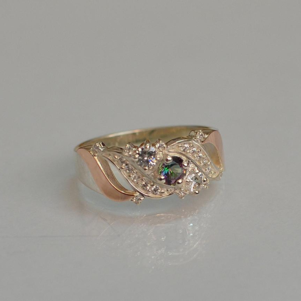 Срібна каблучка з золотими вставками