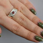 Срібна каблучка з золотими вставками