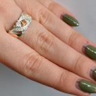 Срібна каблучка з золотими вставками