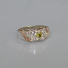 Срібна каблучка з золотими вставками