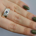 Срібна каблучка з золотими вставками