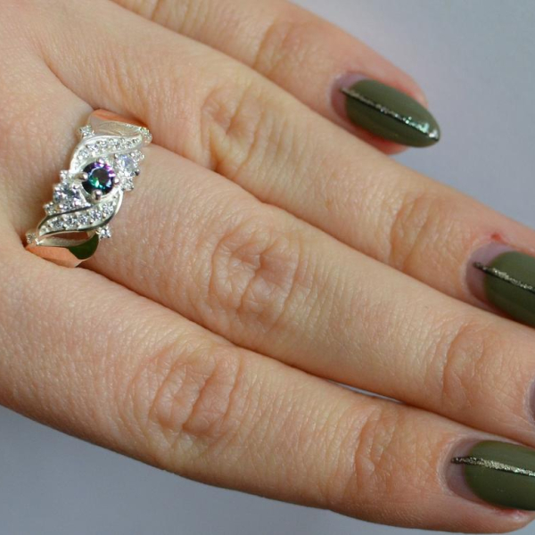 Срібна каблучка з золотими вставками