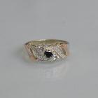 Срібна каблучка з золотими вставками