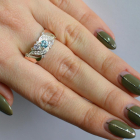 Срібна каблучка з золотими вставками