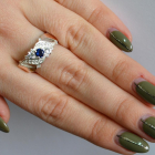 Срібна каблучка з золотими вставками