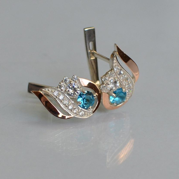 Срібні сережки з золотими вставками