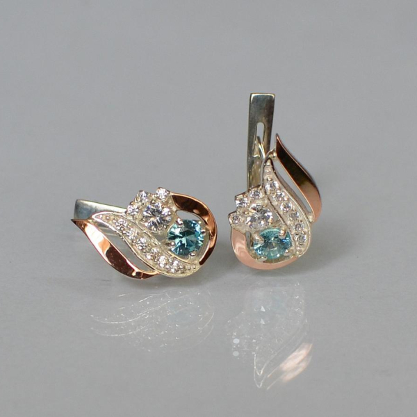 Срібні сережки з золотими вставками