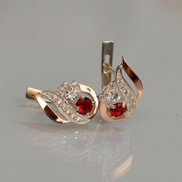 Срібні сережки з золотими вставками