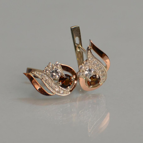 Срібні сережки з золотими вставками