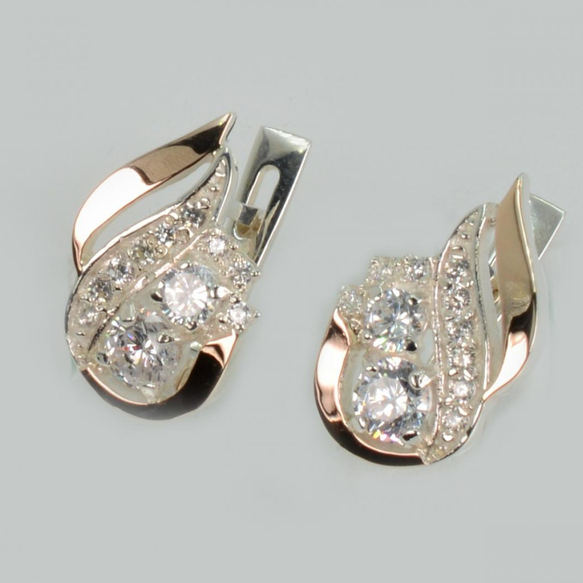 Срібні сережки з золотими вставками