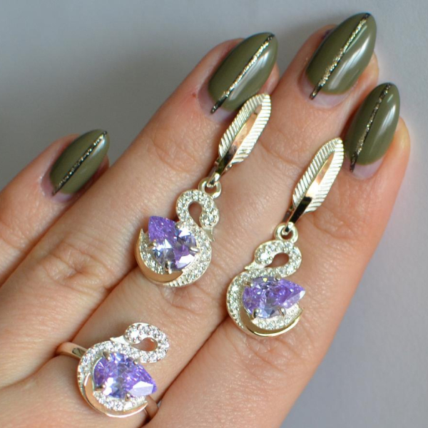 Срібний набір з золотими пластинами