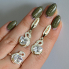 Срібний набір з золотими пластинами