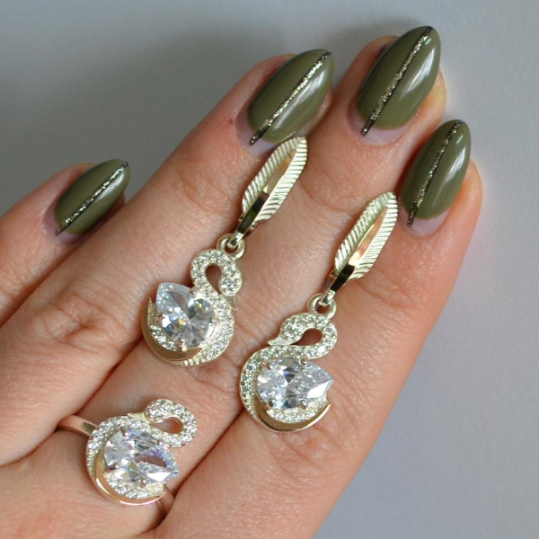 Срібний набір з золотими пластинами