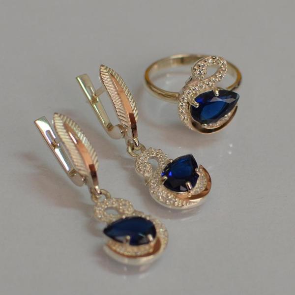 Срібний набір з золотими пластинами