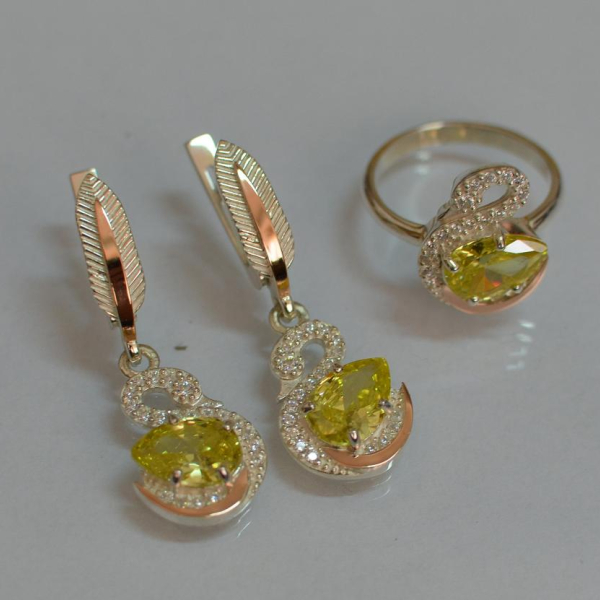 Срібний набір з золотими пластинами