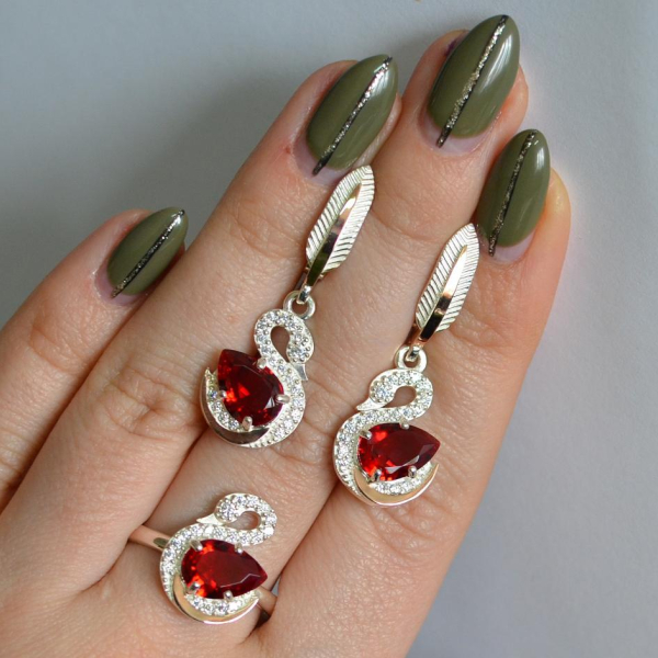 Срібний набір з золотими пластинами