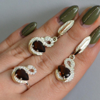 Срібний набір з золотими пластинами