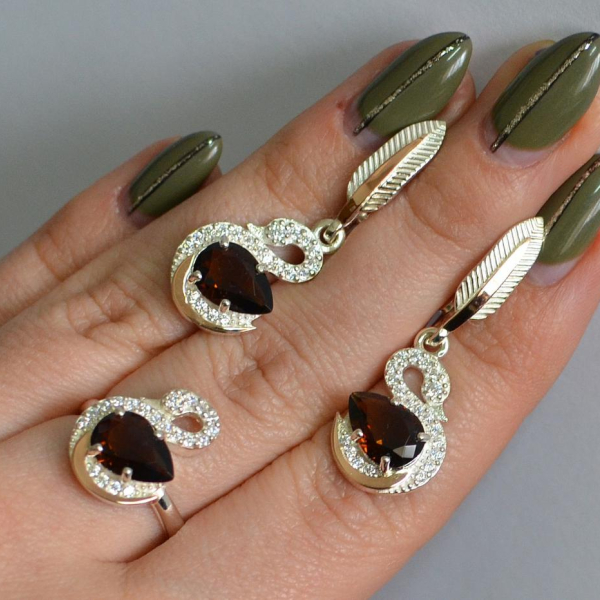 Срібний набір з золотими пластинами