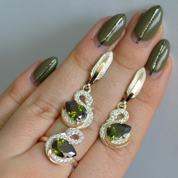 Срібний набір з золотими пластинами