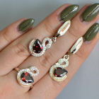 Срібний набір з золотими пластинами