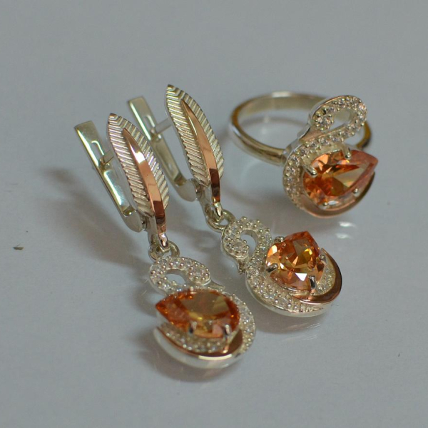 Срібний набір з золотими пластинами