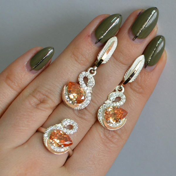 Срібний набір з золотими пластинами