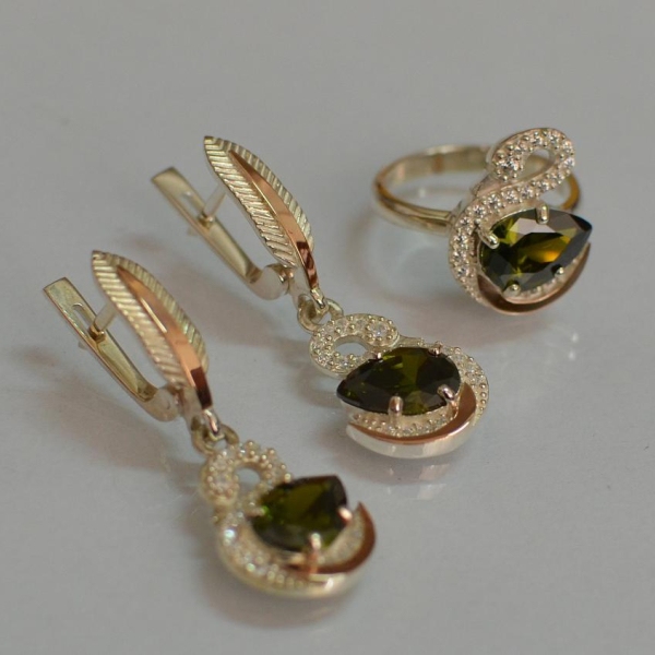 Срібний набір з золотими пластинами