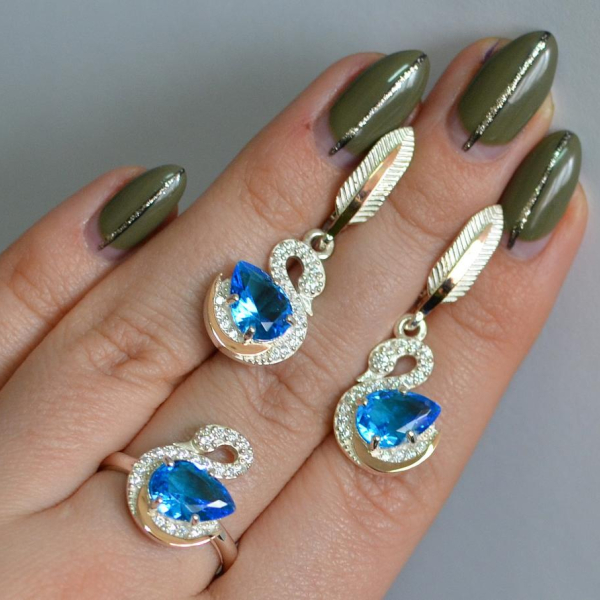 Срібний набір з золотими пластинами