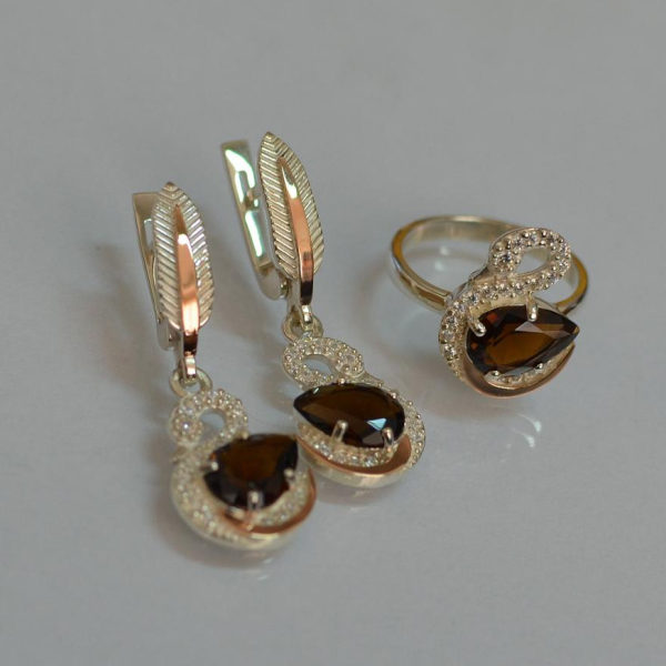 Срібний набір з золотими пластинами