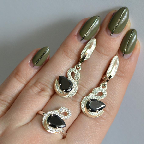 Срібний набір з золотими пластинами