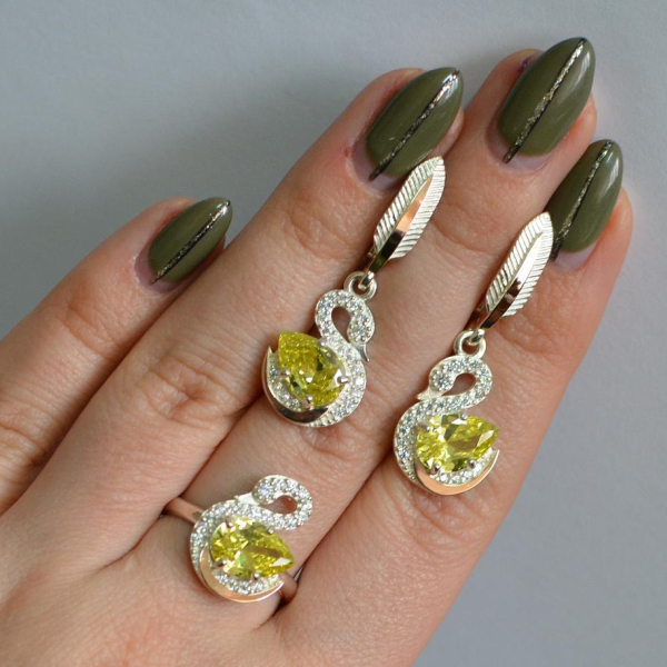 Срібний набір з золотими пластинами